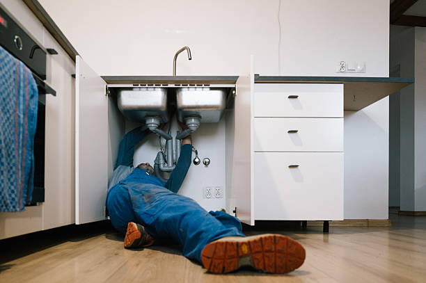 Professional Emergency Plumber technician working in Saco, ME